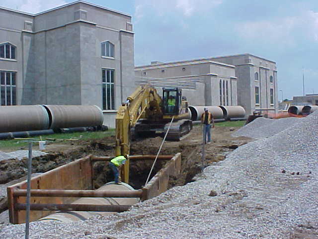 Kelly Shively digging with the excavator at the WWTP on Dwenger Ave in Fort Wayne for Kreager Brothers