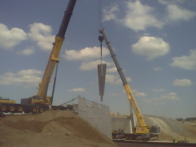 Maxim Crane setting beams for Walsh Construction at the Hoosier Heartland project in Tippecanoe County